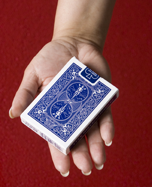 Hand holding a deck of cards