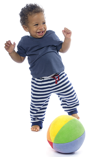 Happy baby playing with a ball.